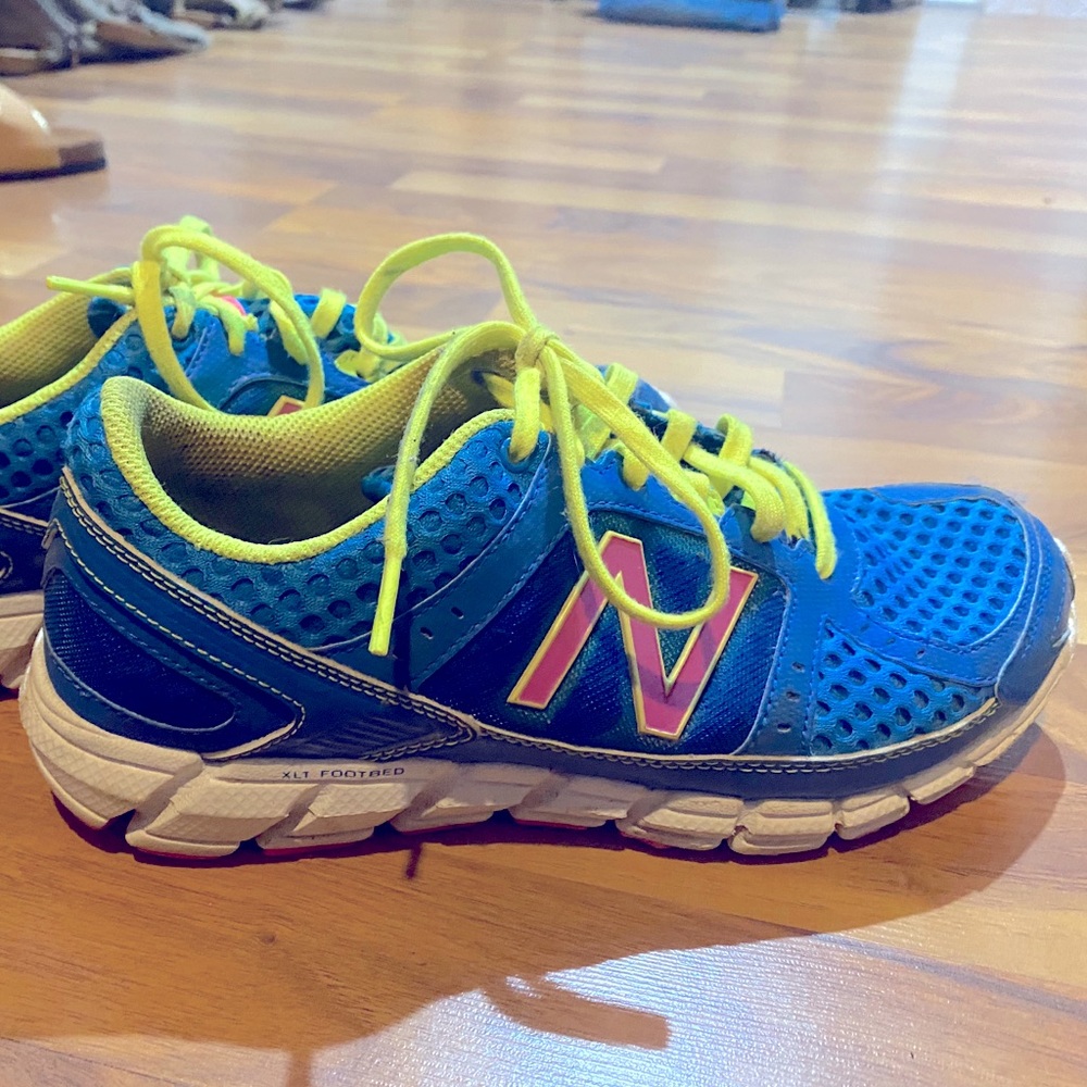 New Balance tennis shoes.